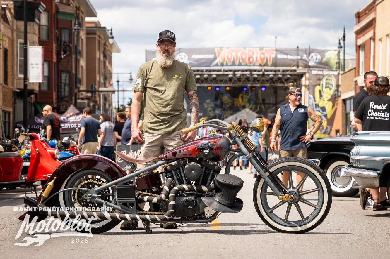 MOTOBLOT Valhalla 2026 finalist Brian Badger poses with his entry, a 1984 Harley-Davidson Sportster 1100 Ironhead.