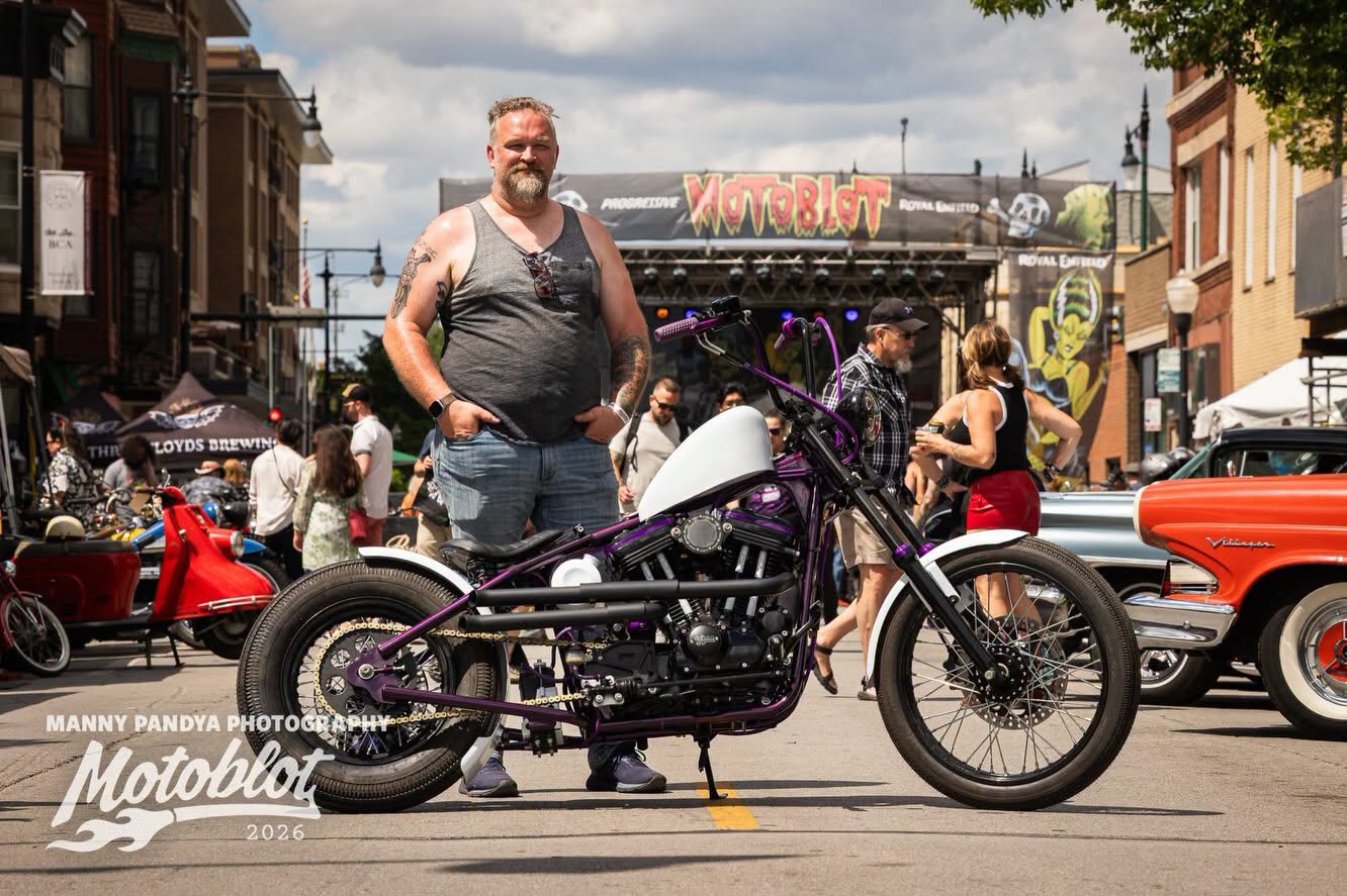 MOTOBLOT Valhalla 2026 third-place finisher Todd R. Bleecker poses with his 1990 Harley-Davidson 883 Hugger.